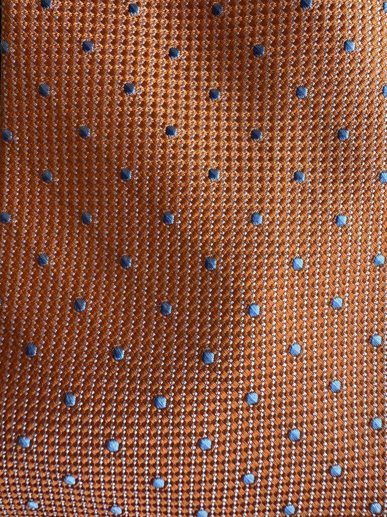 ORANGE WITH BLUE DOTS