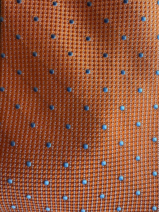 ORANGE WITH BLUE DOTS